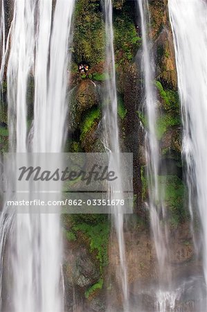 China,Guizhou Province,Huangguoshu Waterfall. Tourists are dwarfed by the largest falls in China,81m wide and 74m high