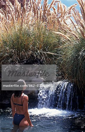 Bathing at the Termas de Puritama,Explora Hotel's hot springs. San Pedro de Atacama,Chile.