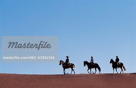 Chile,Atacama Desert. Horse riding in the Atacama desert.