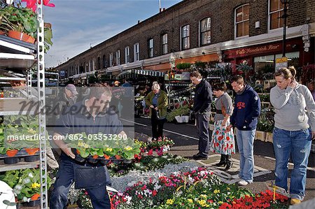 Every Sunday locals flock to the Columbia Road flower market in Hackney,North East London.