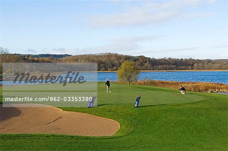 UK,Northern Ireland,Fermanagh. Playing golf on the new course designed by Nick Faldo at Lough Erne Golf Resort .