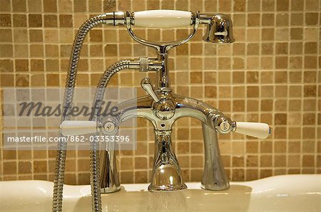 UK, Northern Ireland, Fermanagh, Enniskillen. Detail of roll-top bath in the Lodge at Lough Erne Golf Resort.