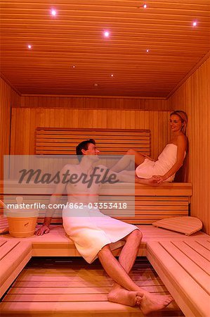 Northern Ireland,Fermanagh,Enniskillen. A couple unwind in the sauna in the Thai spa at Lough Erne Golf Resort .