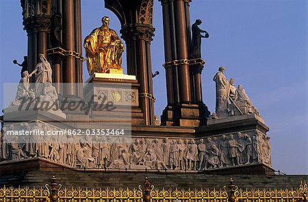 England,London. Commissioned by Queen Victoria to commemorate her late consort,Prince Albert. This large statue of Prince Albert in Hyde Park,is seated in a vast Gothic shrine. It includes a frieze with 169 carved figures,angels and virtues higher up and separate groups representing the Continents,Industrial Arts and Sciences.