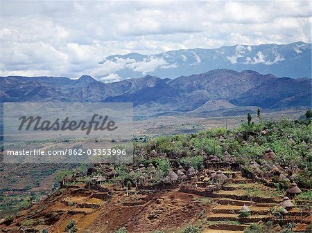 A Konso village set in dramatic scenery in southwest Ethiopia.The Konso people are very industrious farmers,cultivating poor soil on terraces,which are buttressed with dry-stone walls. They share a number of customs with their neighbours,the Borana. They both worship the sky God,Waq,and both have an ancestor cult.