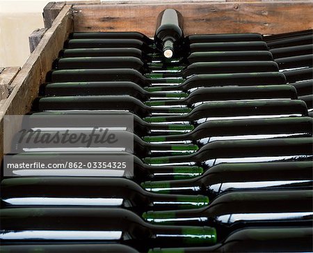 Bottles of Vina Hermosa Reserva 2001 lie in a crate ready for labelling in the wine cellar at the family owned Vina Hermosa winery. 2001 is deemed to have been one of the best years in the history of Rioja wine.