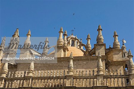 The roof of Seville's cathedral is a sea of Gothic spires. The roof of Seville's cathedral is a sea of Gothic spires.