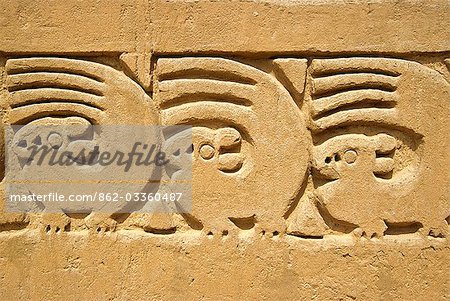 Adobe wall frieze incorporating sea otter and wave design in the Ceremonial Courtyard of the Tschudi Complex,at Chan Chan. Built around 1300 AD and covering 28 square km,Chan Chan is the largest pre-columbian city in the Americas and largest adobe settlement in the world.