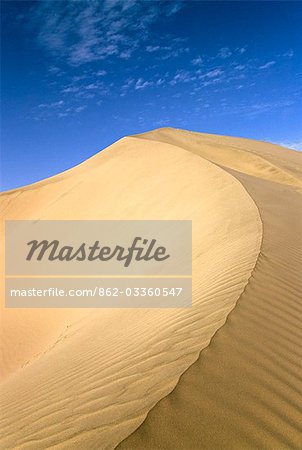 A giant sand curves upwards in the Peruvian coastal desert,near Ica in the south of Peru