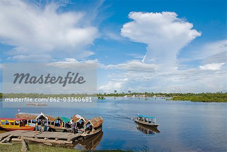 Peru,Amazon,Amazon River. Ferryboats docking at the village of Padrecocha,a twenty minute ride along the Nanay River from Iquitos.