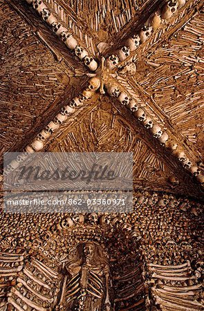 Portugal,Alentejo Region. A small chapel called,Capela dos Ossos was created after a disaster struck the village in 1732. Lightening struck a gunpowder magazine destroying the Citadel and killing 1,500 people.