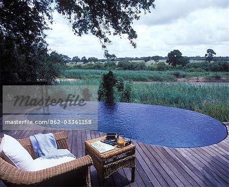 Each suite at Singita has a private deck and plunge pool looking our to the bush beyond