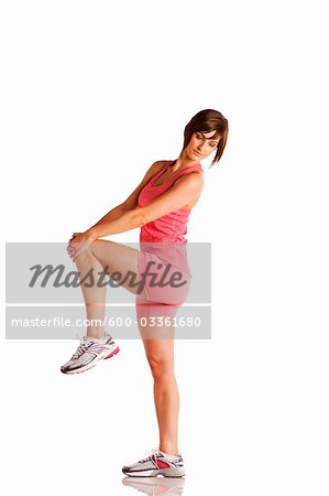 Woman Exercising in Studio