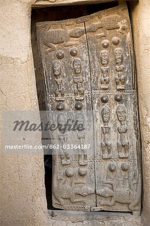 Mali,Dogon Country. A finely carved old Dogon door of a traditional house at Sangha,an attractive Dogon village built among rocks on top of the Bandiagara escarpment.
