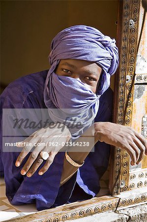 Mali,Timbuktu. A Tuareg man at the window of house at Timbuktu.