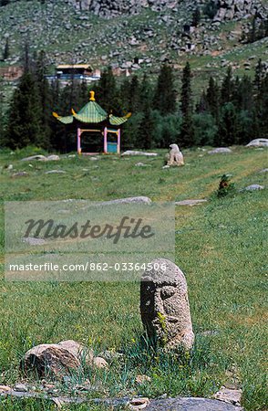 Ancient stone statues guard the entrance to Manzshir Monastery established 1733AD,Bogd Uul (Sainrs) Mountains