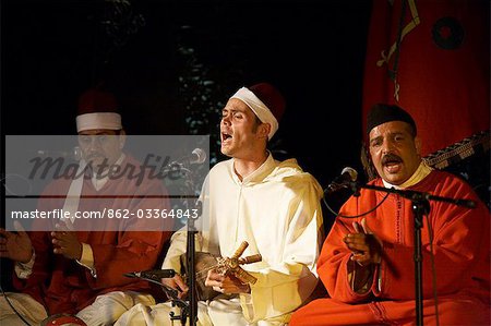 Morocco,Fes. The Hamadchas Brotherhood with Frederic Calmes perform at the Dar Tazi during the Fes Festival of World Sacred Music.