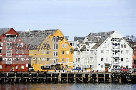 Norway,Troms,Tromso. The city centre of Tromso contains the highest number of old wooden houses in North Norway and a very distinctive and traditional look to the waterfront that overlooks the old port area.