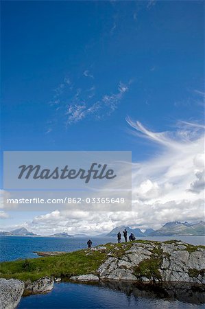 Norway,Nordland,Helgeland. Looking out over the Ulvangen channel towards the island of Lokta and Hugla from a peninsula created by a glacial tarn