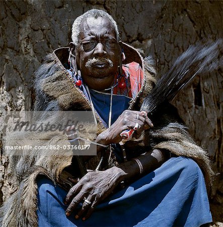 Ole Senteu Simel,grandson of the famous Maasai Laibon Mbatian (after which the highest peak of Mount Kenya is named),was the most respected laibon of the Maasai until his death in 1986. This photograph was taken three weeks before he died. Maasai Laibons are the soothsayers and clairvoyants of the tribe and control all ceremonial occasions.