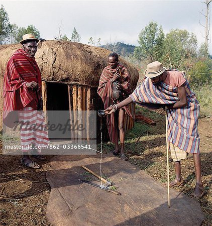 The day before Samburu boys are circumcised in their lorora,(a purpose-built circumcision encampment),senior elders will bless the sharp instruments of every household,such as pangas and axes,by pouring a little milk over them as they intone a blessing. The instruments must be laid out on the oxhide upon which the boy of each household will be circumcised.