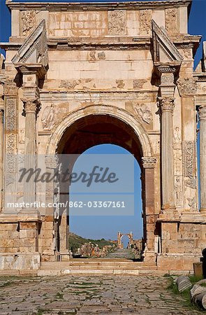 The Arch of Septimus Severus looking towards the Arch of Trajan,at Leptis Magna,Libya.