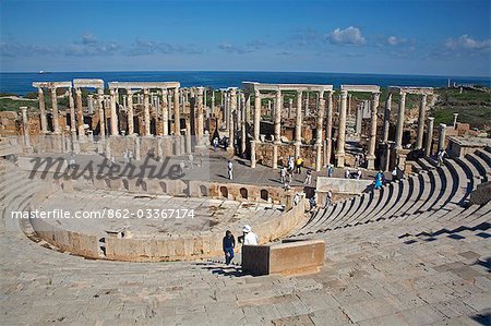 View of the Theatre at Leptis Magna,Libya with the Mediterranean in the background. This is one of the oldest theatres in the Roman world and was donated to Leptis in 1-2 AD by Annobal Rufus.