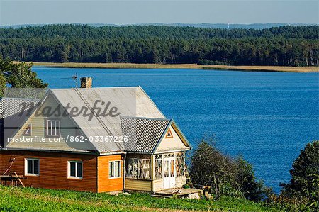 Lithuania,Aukstaitija National Park,Land of Lakes and Hills. A lakeside farmhouse in Lithuania's first National Park.