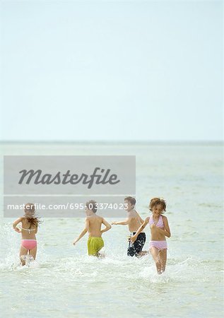 Children playing in sea