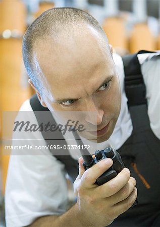 Factory worker using walkie talkie