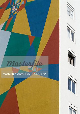 Multicolored mural on wall of apartment building