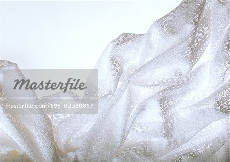 Crumpled white fabric, close-up