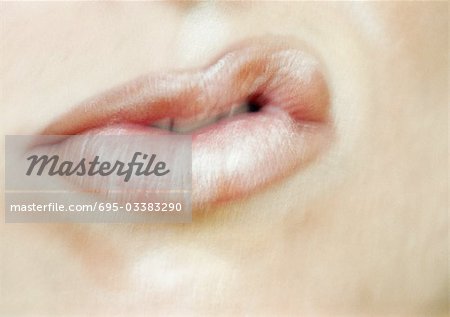 Close up of woman's mouth, snarling