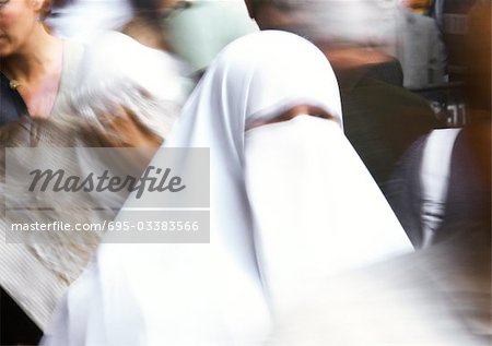 Israel, Jerusalem, veiled woman in crowd