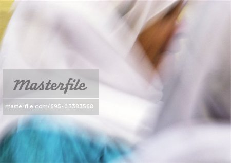 Israel, Jerusalem,woman wearing headscarf, close-up, blurred