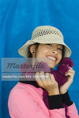 Teenage girl smiling at camera, portrait