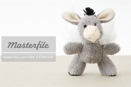 Stuffed toy donkey with wings, close-up