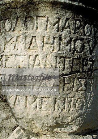 Ancient Greek manuscript engraved in stone.
