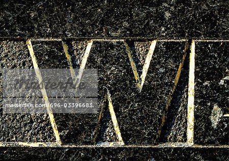 W, text, carved. W, text, carved.