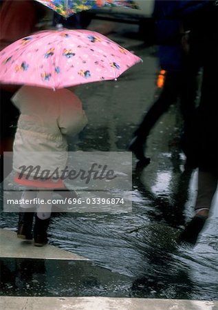 People walking in rain