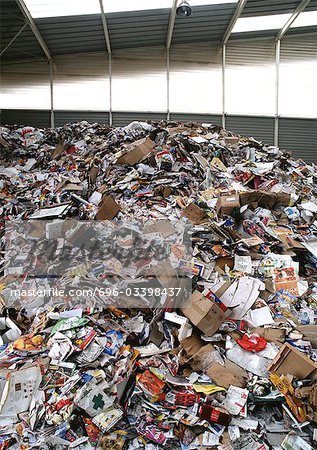 Trash piled in recycling center