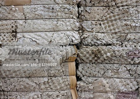 Bales of compacted egg cartons