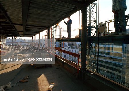 Two people in construction site