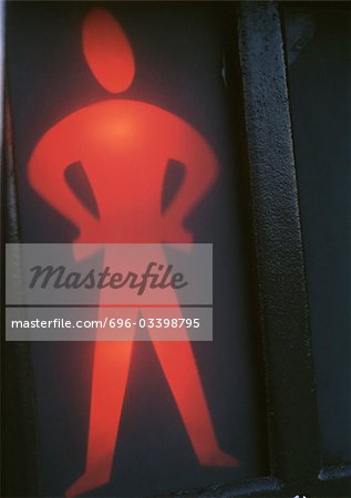 Red pedestrian crossing light, close-up
