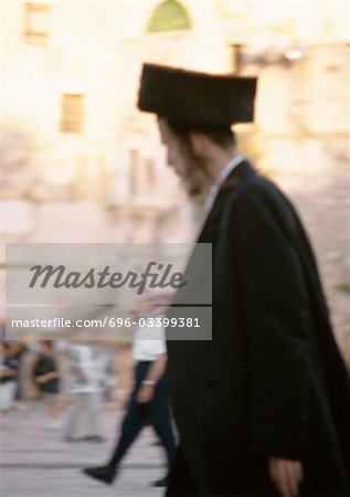 Israel, Jerusalem, Orthodox Jew, side view, blurred