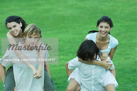 Group of young friends, riding piggyback