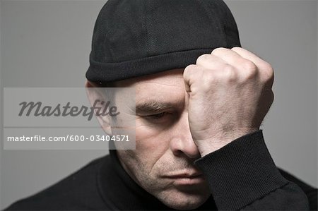 Portrait of Man in Black Cap