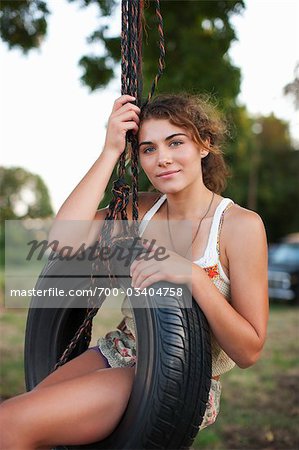 Woman on a Tire Swing, Portland, Oregon, USA