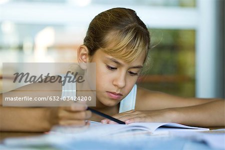Female junior high student studying