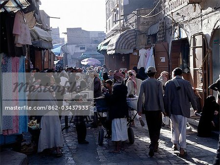 Surrounded by a massive 20 to 30-foot high wall,old Sana'a is one of the world's oldest inhabited cities. The suq or central market is located in a labyrinth of streets and alleyways in the centre of the old city. A large variety of merchandise is offered for sale yet sectors specialising in specific commodities make shopping comparatively easy.